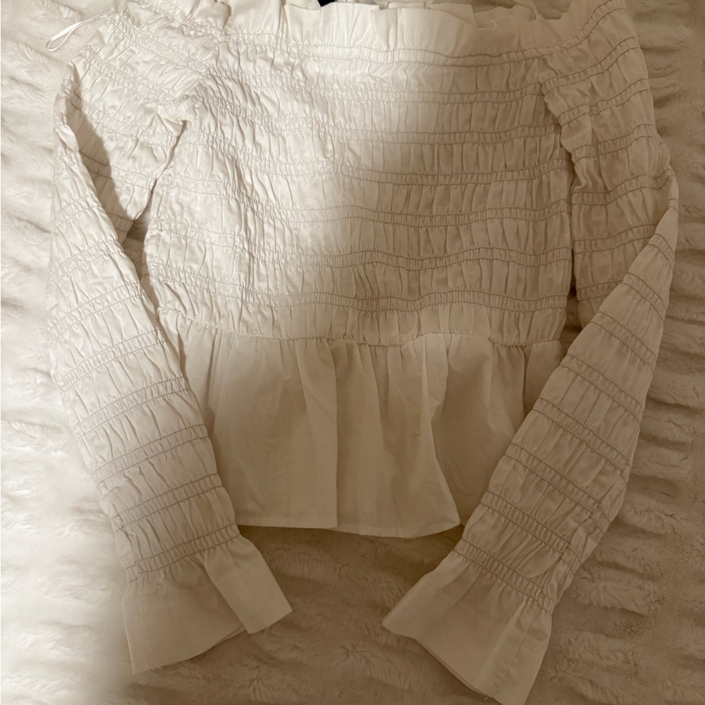Divided Cream Smocked Peplum Blouse
